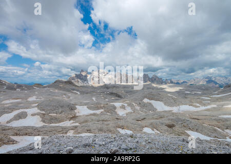 Open views of the Rosetta plateau in the Dolomites. Rocky, deserted moonscape in the mountains. Barren mountainscape, alpine scenary. Stock Photo