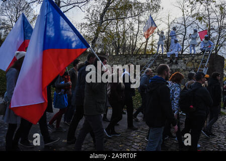 Thousands of people take part in a remembrance procession during the 30th anniversary of the Velvet Revolution.The Velvet Revolution or Gentle Revolution was a non-violent transition of power in Czechoslovakia ending the 41 years old one party rule. Stock Photo