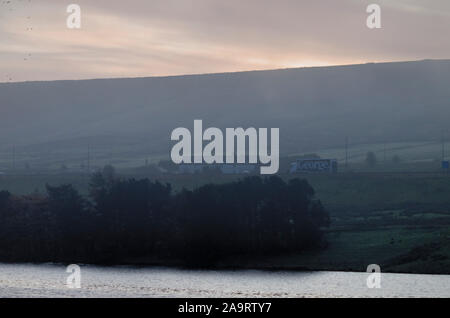 Stott Hall Farm across Booth Wood Reservoir from pub on A672 Ripponden / Oldham Road Rishworth Stock Photo