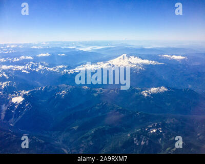 Flying over the rocky mountains towards Vancouver Stock Photo