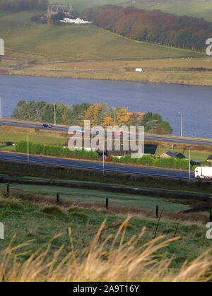 Stott Hall Farm, Booth Wood Reservoir & M62 in the mist fog from B6114 Saddleworth Road nr Moselden Height Scammonden Stock Photo