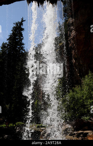 Spouting Rock, a much larger waterfall than those of its more famous neighbour Hanging Lake. Spouting Rock is a short detour from Hanging Lake. Stock Photo