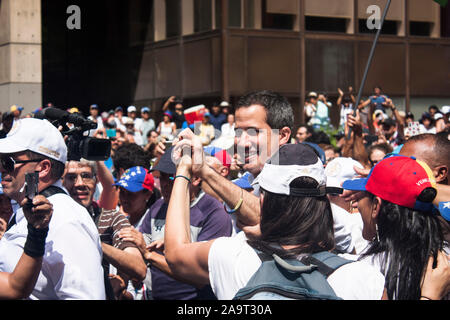 Juan Guaidó, self-proclaimed president of Venezuela and president of the National Assembly, march during a protest against Nicolás Maduro. Stock Photo