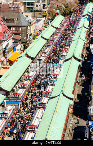 View of the crowded Nakamise shopping street near Sensoji temple in