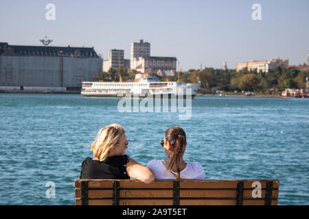 ISTANBUL, TURKEY - SEPTEMBER-14.2019: People resting on the seashore of Kadikoy coast. Stock Photo