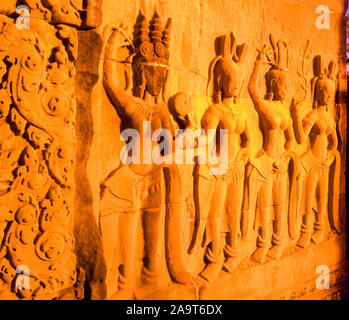 Wall carvings at sunset, Bayon Temple, Angkor Watt Archeological Park, Cambodia, City of Angkor Thom, Built 1100-1200, Khymer Culture rins