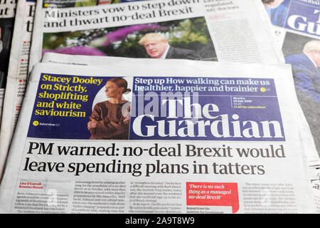 'PM warned:  no-deal Brexit would leave spending plans in tatters' Guardian newspaper headline on 29 July 2019 in London UK Great Britain Stock Photo