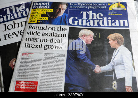'Pound on the slide as alarm over no-deal Brexit grows' & Boris Johnson meeting Nicola Sturgeon 30 July 2019 Guardian newspaper headline in London UK Stock Photo