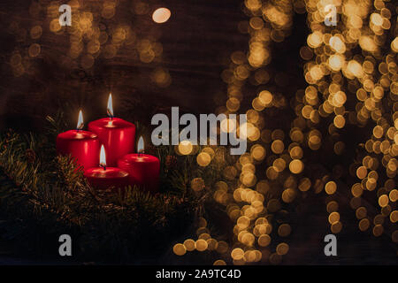 Christmas decoration with christmas four candles burning for advent season, selective focus Stock Photo