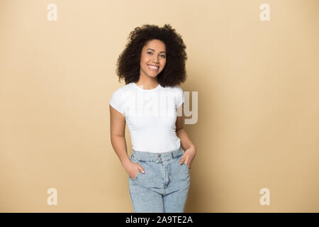 Portrait of customer in white shirt and blue suspenders in tailors boutique  stock photo