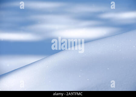 Beautiful fresh snow patterns. Winter background. Close up texture. Stock Photo