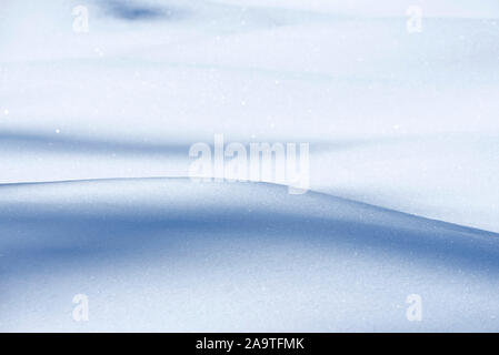 Beautiful fresh snow patterns. Winter background. Close up texture. Stock Photo