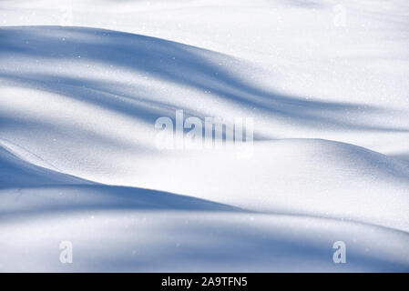 Beautiful fresh snow patterns. Winter background. Close up texture. Stock Photo