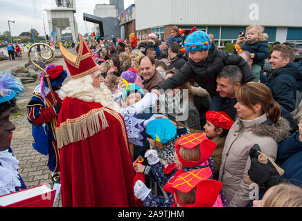 ENSCHEDE, THE NETHERLANDS - NOV 16, 2019: The dutch Santa Claus called 'Sinterklaas' is greeting the children after he has arrived on a boat in a dutc Stock Photo