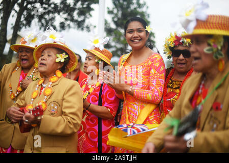 People from the island of Niue in the South Pacific welcome the Prince of Wales and the Duchess of Cornwall as they arrive for a wreath laying ceremony at Mount Roskill War Memorial in Auckland, on the second day of the royal visit to New Zealand.