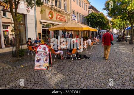 Bautzen, Germany - September 1, 2019: Shopping street with sidewalk restaurants, Reichenstrasse in the historic Old town of Bautzen in Upper Lusatia Stock Photo