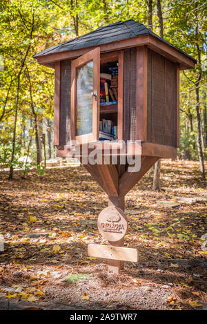Outdoor Little Library book exchange at Panola Mountain State Park near Atlanta, Georgia. (USA) Stock Photo