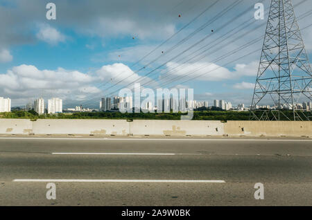 telegraph in front of skyline of a city Stock Photo