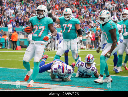 Miami Gardens, Florida, USA. 17th Nov, 2019. Miami Dolphins running back Kalen Ballage (27) scores a touchdown against the Buffalo Bills during the second quarter of an NFL football game at the Hard Rock Stadium in Miami Gardens, Florida. Credit: Mario Houben/ZUMA Wire/Alamy Live News Stock Photo