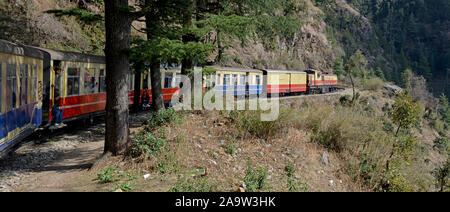 The Kalka–Shimla Railway is a narrow gauge railway in North-West India travelling along a mostly mountainous route from Kalka to Shimla..Shimla is the capital city of the Indian state of Himachal Pradesh, located in northern India at an elevation of 7,200 ft.. Stock Photo