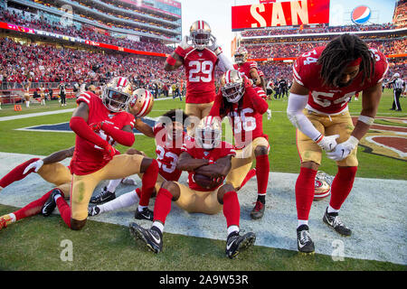Santa Clara, CA, USA. 17th Nov, 2019. San Francisco 49ers' D.J. Reed Jr. (32), San Francisco 49ers' Emmanuel Moseley (41), and San Francisco 49ers' Jeff Wilson Jr. (30) celebrate touchdown in the fourth quarter again the Arizona Cardinals during a game at Levi's Stadium on Sunday, November 17, 2019 in Santa Clara. Credit: Paul Kitagaki Jr./ZUMA Wire/17�Թ����� Live News Stock Photo
