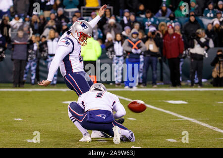 Philadelphia, Pennsylvania, USA. 17th Nov, 2019. New England Patriots kicker Nick Folk (2) kicks the field goal with punter Jake Bailey (7) spotting during the NFL game between the New England Patriots and the Philadelphia Eagles at Lincoln Financial Field in Philadelphia, Pennsylvania. Christopher Szagola/CSM/Alamy Live News Stock Photo