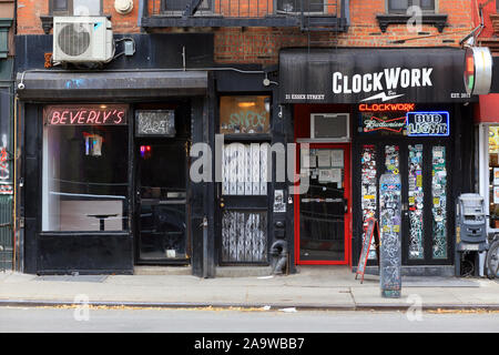 Beverly's, Clockwork, 21 Essex Street, New York, NY. exterior storefront of local bars in the Lower East Side neighborhood of Manhattan Stock Photo