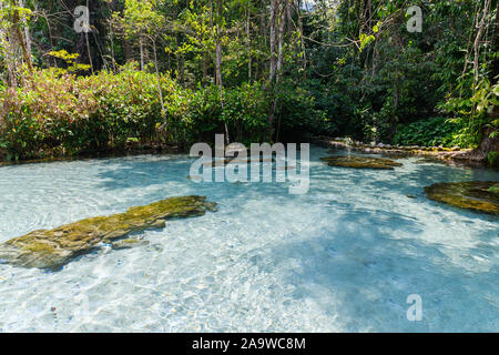 Crystal clear water at Ban Nam Rad watershed forest in Surat Thani/unseen Thailand, Travel concept Stock Photo