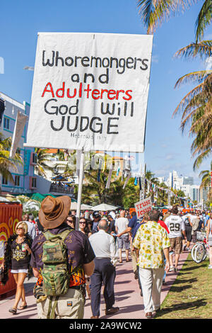 Miami Beach Florida,Ocean Drive,Super Bowl XLIV Week,NFL,football,street preachers,religion,sign,FL100207168 Stock Photo