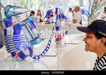 Miami Beach Florida,Ocean Drive,The Art of Can,Red Bull,product marketing,gallery,galleries,dealer,dealers,gallerist,recycled aluminum cans,Black woma Stock Photo