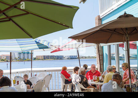 Florida Charlotte County,Punta Gorda,Fisherman's,men's Village Waterfront Mall,Resort & Marina,Peace River water,Charlotte Harbor,harbour,The Captain' Stock Photo