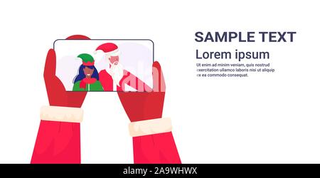 hands holding smartphone santa claus with african american female elf helper on screen christmas holidays celebration concept online mobile app portrait horizontal copy space vector illustration Stock Vector