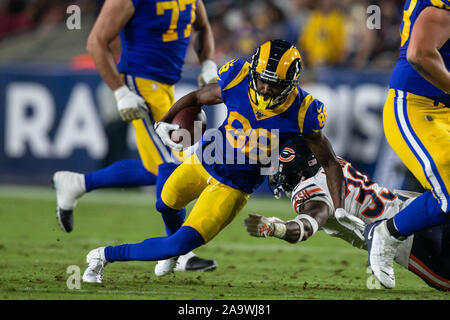 Chicago Bears wide receiver Johnny Knox (R) is tackled by Atlanta Falcons  defensive back Thomas DeCoud (28) and defensive back Dunta Robinson (23)  after a 25-yard reception during the first quarter at