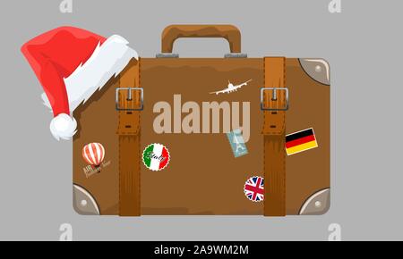 Old style vintage brown voyage suitcase with travel stickers and christmas or santa claus hat or cap. Vector illustration. Stock Vector