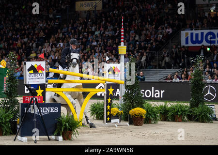 Stuttgart, Germany. 17th Nov, 2019. 35th Stuttgart German Masters, World Cup, Equestrian Sport, Jumping, Grand Prix of Stuttgart: Germany's Gerrit Nieberg rides his horse Contagio. Credit: Sebastian Gollnow/dpa/Alamy Live News Stock Photo