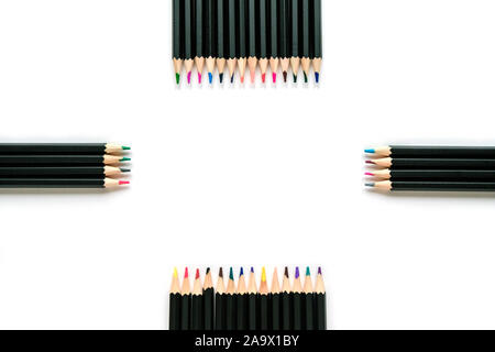 Colored pencils on white background. Isolate. Space for text Stock Photo