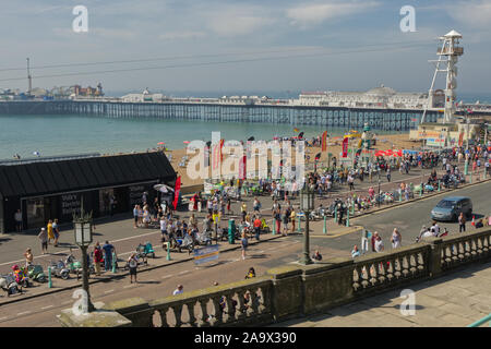 Brighton, England - August 24, 2019: Scooters on display along seafront promenade at Brighton beach in East Sussex, England for 'Mod Weekend'. Palace Stock Photo