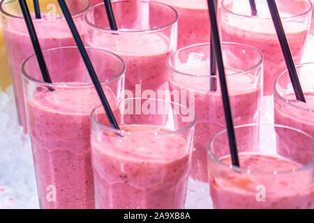 Cold fruit juice on ice in a market. Drinks. Stock Photo
