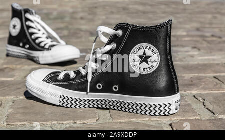 haak schreeuw Winderig Chartres, France - Spetember 2, 2019: Image of a pair of All Star Converse  sneakers on a cobblestone street Stock Photo - Alamy