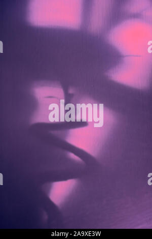 Closeup blurred purple pink abstract background with shadows and spiral shapes Stock Photo