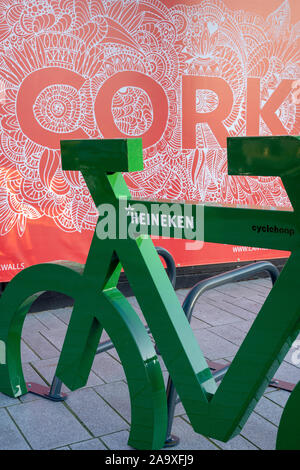 Bicycle shaped bike rack on the sidewalk Stock Photo - Alamy