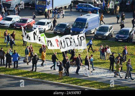Prague, Czech Republic - Nov 16, 2019: Crowd protests against Prime Minister Babis and Minister of Justice on Letna, Letenska plan. The 30th anniversary of the fall of communism, waving Transparents. Stock Photo