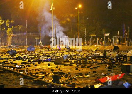 Hong Kong, China. 17th Nov, 2019. Protesters set fire to the entrance of Hong Kong's Polytechnic University to stop riot police from entering. Credit: Gonzales Photo/Alamy Live News Stock Photo