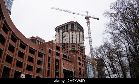 The construction of a large round brick building. Stock Photo