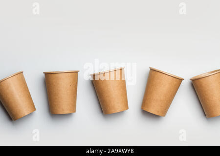 Paper cups on a gray background Stock Photo