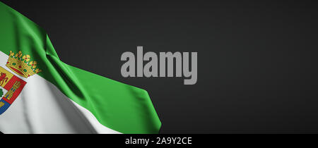 Flag of Extremadura cloth on dark background Stock Photo