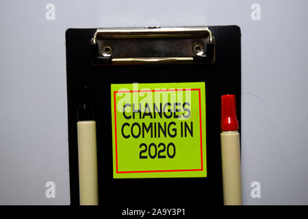 Changes Coming in 2020 text on sticky notes isolated on office desk Stock Photo