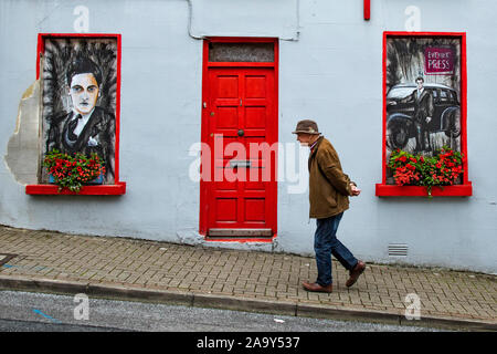 Irish man walking up street in Cathedral Quarter Letterkenny County Donegal Republic of Ireland Stock Photo