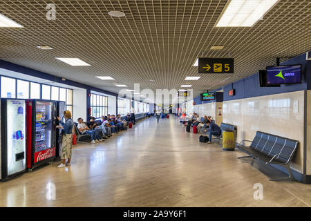 Seville, Spain - May 23, 2019:  Waiting area and access gates to board at the Seville airport Stock Photo