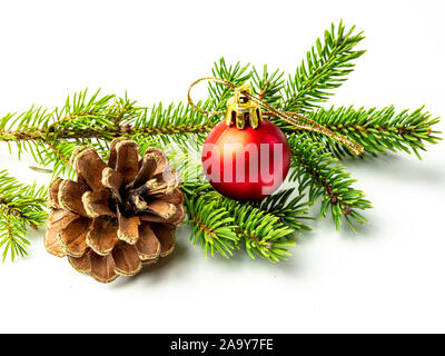Template fir branch with pine cones and Christmas ball Stock Photo